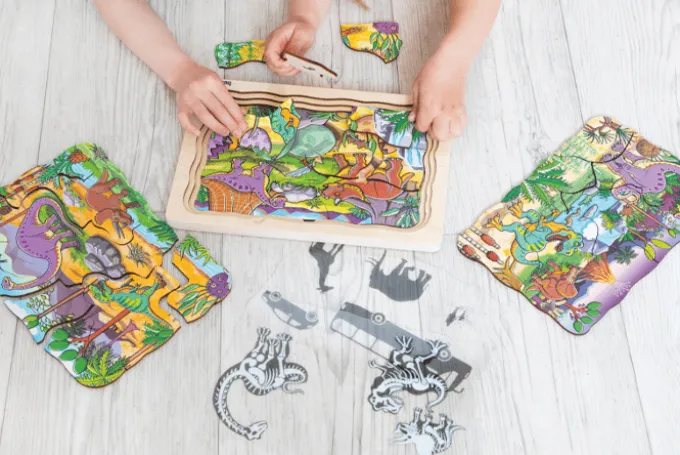 Lagenpuzzle Dino, 4 Lagen m. 44 Teilen