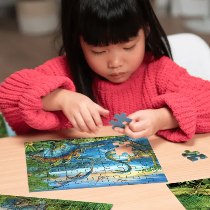 Puzzle mit 3 x 49 Teilen – Dinosaurier