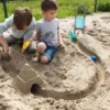 Sandspielzeug Cuppi - Schaufelsieb mit Ball, grau